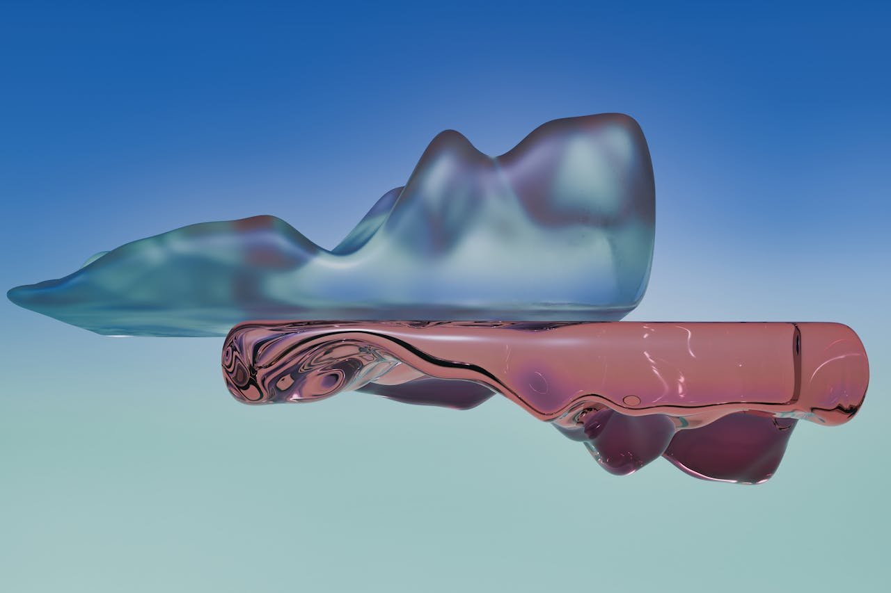 A captivating abstract image featuring translucent glass shapes with soft hues floating against a gradient blue background.